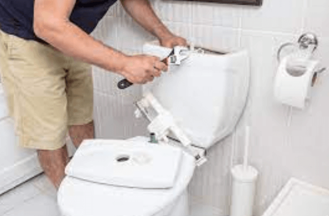 repairing a toilet cistern